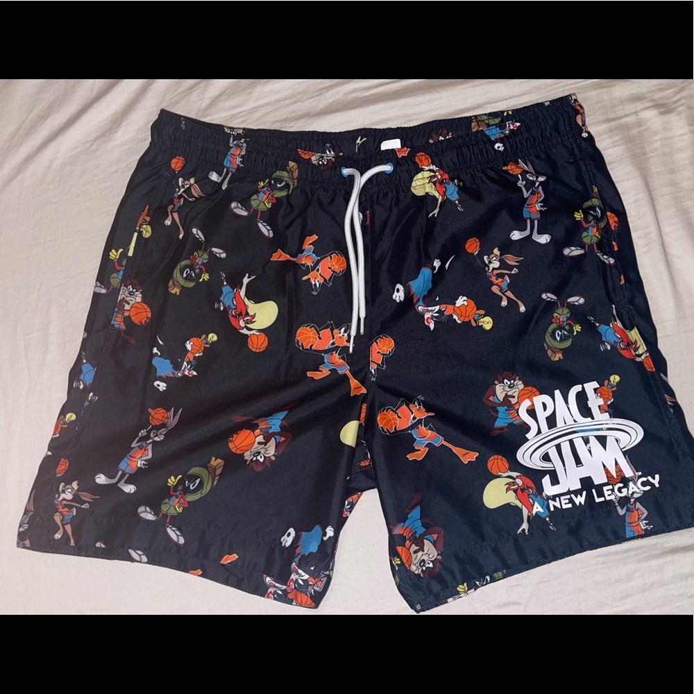 nostalgic Space Jam Swim Trunks.